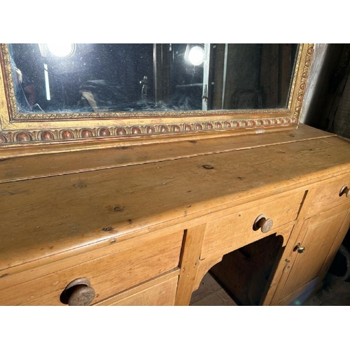 480 - A 19th century pine knee hole farmhouse dresser base with four graduated drawers and one central, 91... 