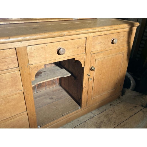 480 - A 19th century pine knee hole farmhouse dresser base with four graduated drawers and one central, 91... 