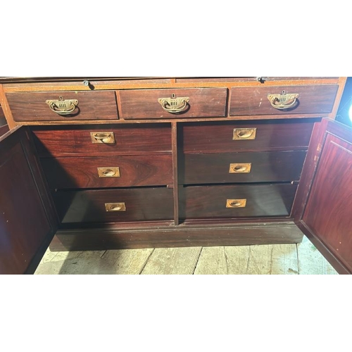 482 - An early 20th century mahogany gunsmith's cabinet with glazed upper and sectional green bazed gunrac... 