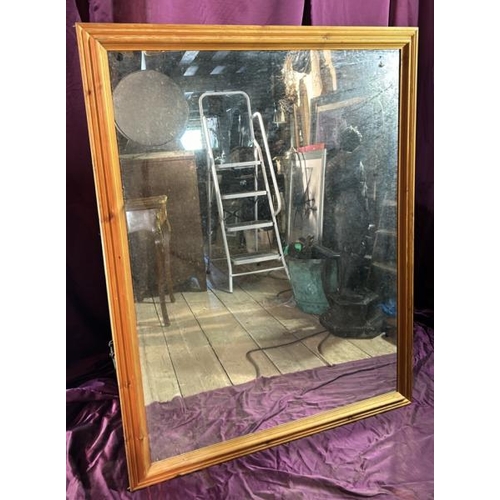 484 - A modern farmhouse style mirror in pine frame, 134cm (h) x 104cm (w)  / All lots are located at The ... 