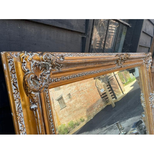 485 - Large 20th century oversized gilt mirror with bevelled plate, 222cm (w) x 161cm (h), the mirror meas... 