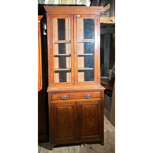 499 - A 19th century oak display cabinet with glazed upper, four internal shelves over single drawer and c... 