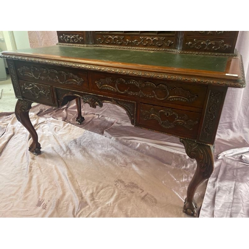 501 - A circa 1900, Georgian style highly decorative and carved mahogany lined writing desk with leather i... 