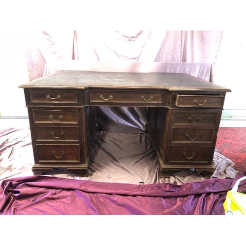 502 - A large Edwardian mahogany partners desk with leather inlaid, complete with nine drawers to one side... 