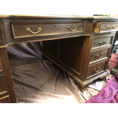 502 - A large Edwardian mahogany partners desk with leather inlaid, complete with nine drawers to one side... 