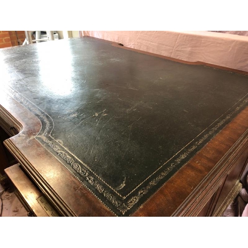 502 - A large Edwardian mahogany partners desk with leather inlaid, complete with nine drawers to one side... 