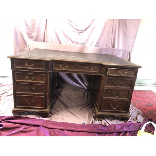 502 - A large Edwardian mahogany partners desk with leather inlaid, complete with nine drawers to one side... 