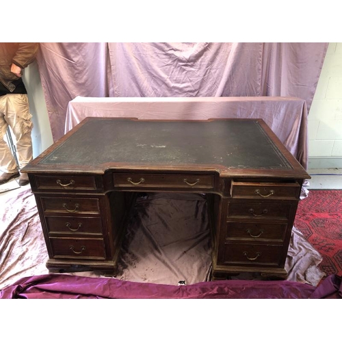 502 - A large Edwardian mahogany partners desk with leather inlaid, complete with nine drawers to one side... 