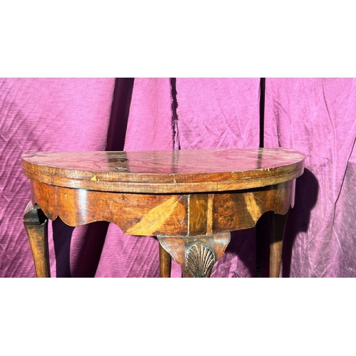 507 - Early 19th century walnut metamorphic games table in semi-circular form, with shell motif's on three... 