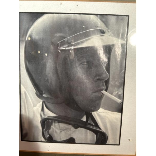 549 - A framed and glazed print of the American racecar driver Richie Ginther, 56cm (h) x 48.5cm (w)  / Al... 