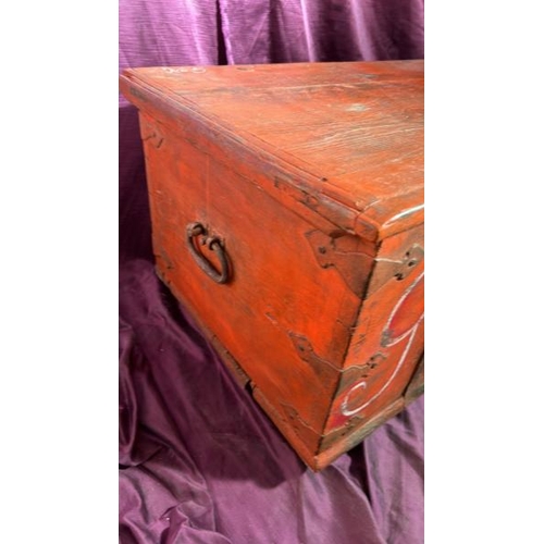 557 - A 19th century oak metal banded trunk with GR sypher and hand painted coat of arms applied in old re... 