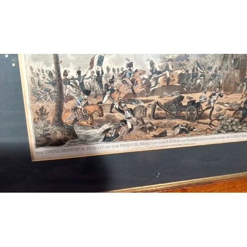 563 - A framed and glazed print of the Battle of Waterloo, 50.5cm (h) x 66cm (w)  / All lots are located a... 