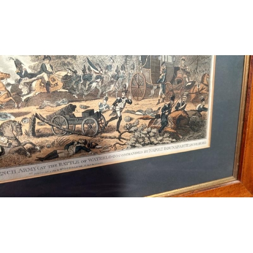 563 - A framed and glazed print of the Battle of Waterloo, 50.5cm (h) x 66cm (w)  / All lots are located a... 