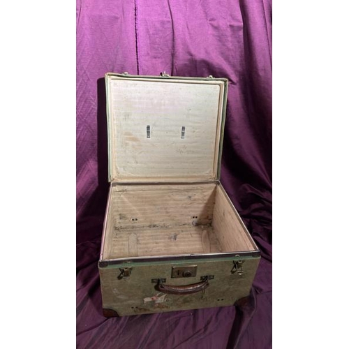 564 - An early 20th century canvas bound and riveted luggage trunk, 31cm (h) x 50.5cm (w) x 45.5cm (d)  / ... 