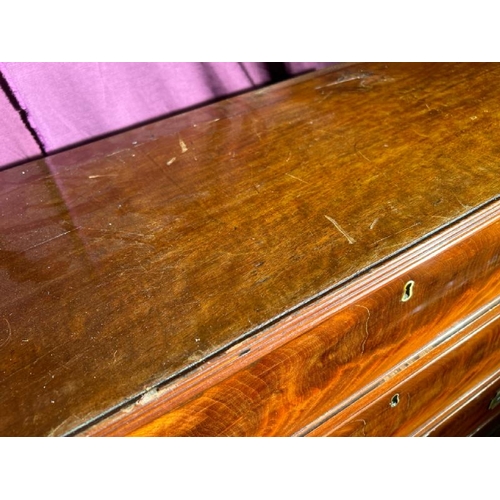 570 - A circa 1900 framed mahogany chest of five graduated drawers with recessed brass military campaign h... 