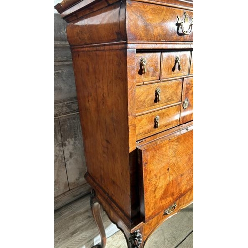 571 - An 18th century Queen Anne walnut escritoire on associated base, profusely carved and inlaid through... 