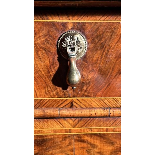 571 - An 18th century Queen Anne walnut escritoire on associated base, profusely carved and inlaid through... 