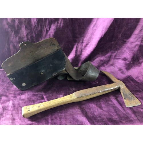 62 - Early 20th century firemans axe with pouch, 40cm (l) x 20cm (w)  / All lots are located at The Barn,... 