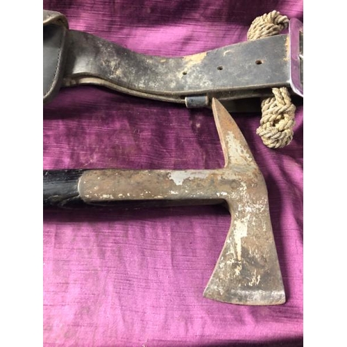 63 - Early 20th century firemans axe with pouch, 38.5cm (l) x 20cm (w)  / All lots are located at The Bar... 