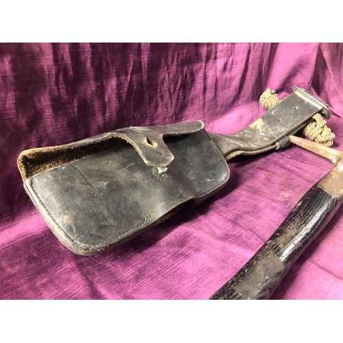 63 - Early 20th century firemans axe with pouch, 38.5cm (l) x 20cm (w)  / All lots are located at The Bar... 