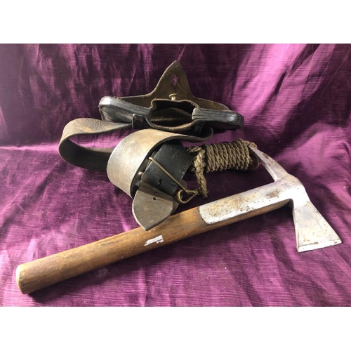 65 - Early 20th century firemans axe with pouch, 38.5cm (l) x 18.5cm (w)  / All lots are located at The B... 