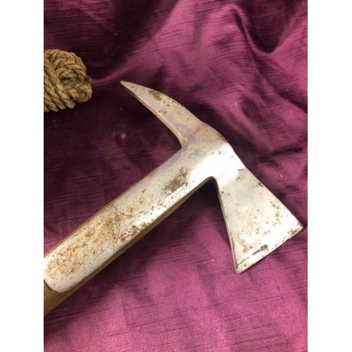 65 - Early 20th century firemans axe with pouch, 38.5cm (l) x 18.5cm (w)  / All lots are located at The B... 