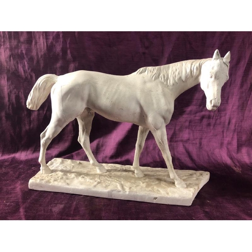 72 - Plaster mouldingof a horse, damaged base, 26cm (h) x 40cm (l)  / All lots are located at The Barn, H... 