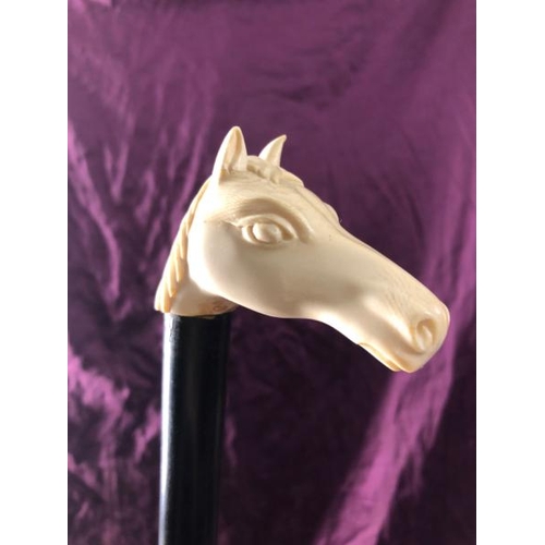 92 - Walking cane with horse ferrule which appears to be resin or possibly bone, 91cm (l)  / All lots are... 