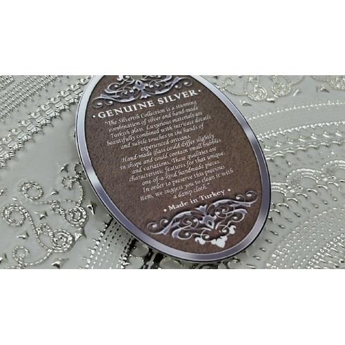 113 - A handmade platter, labelled as genuine silver with Turkish glass, 40cm (dia)  / All lots are locate... 