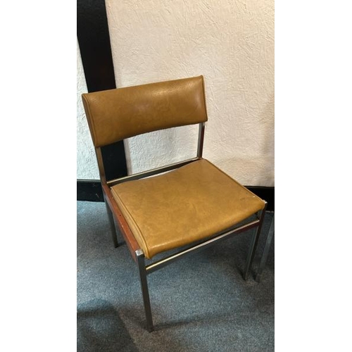 12 - A pair of 60's/70's style dining chairs with mustard yellow seat and back, on metal frame, 76cm (h) ... 