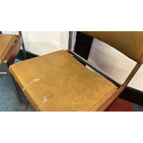 12 - A pair of 60's/70's style dining chairs with mustard yellow seat and back, on metal frame, 76cm (h) ... 