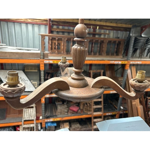 124 - A converted wooden three-arm ceiling light, 59cm drop x 47cm (dia)  / All lots are located at Gower ... 