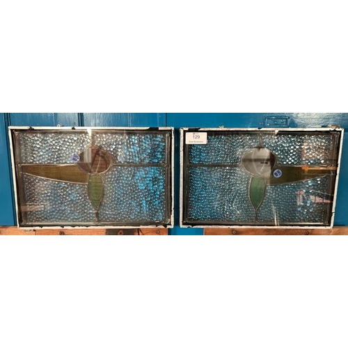 129 - A matching pair of stained glass windows, 31cm (h) x 48cm (w)  / All lots are located at Gower Recla... 