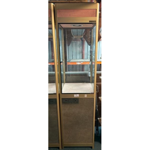 151 - A tall glass display cabinet, with light and key, without internal glass shelf, 200cm (h) x 50cm (w)... 