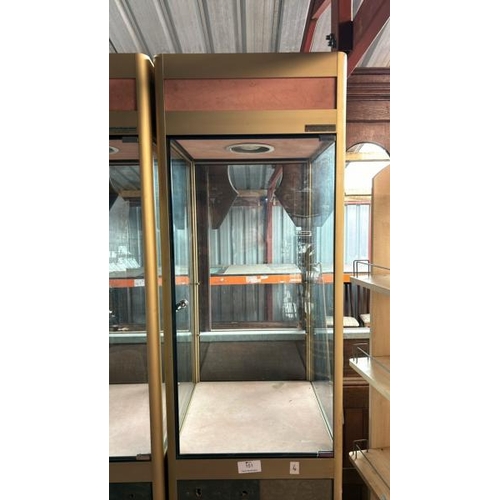 151 - A tall glass display cabinet, with light and key, without internal glass shelf, 200cm (h) x 50cm (w)... 