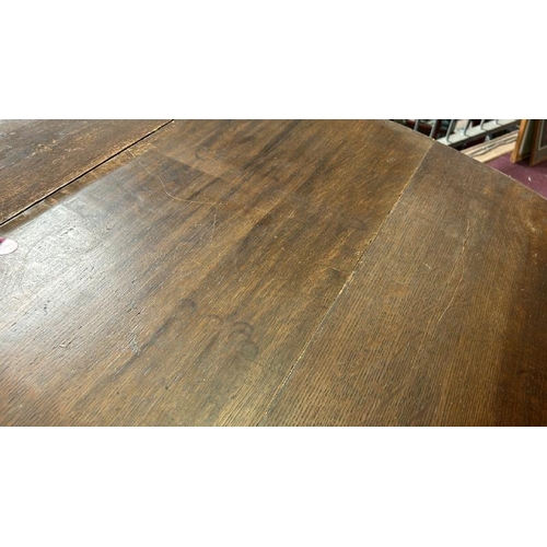 162 - Circular oak drop leaf table on turned legs, 73cm (h) x 105cm (w)   / All lots are located at Gower ... 