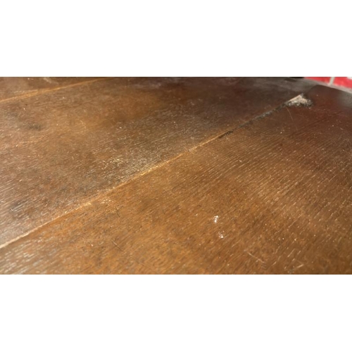 165 - Small circular oak table on turned legs, 48cm (h) x 78cm (w) x 58cm (d)  / All lots are located at G... 