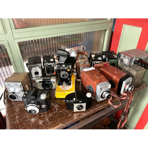 166 - A quantity of photo and video cameras including Kodak, Super 8, Fujifilm and Conway, with associated... 