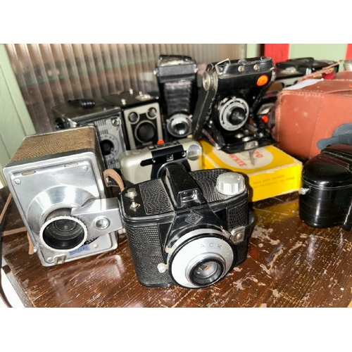 166 - A quantity of photo and video cameras including Kodak, Super 8, Fujifilm and Conway, with associated... 