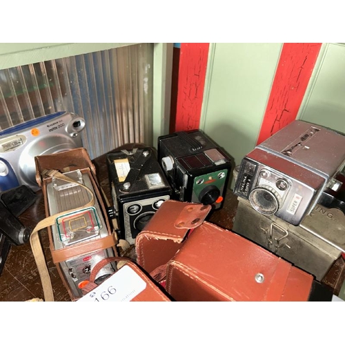 166 - A quantity of photo and video cameras including Kodak, Super 8, Fujifilm and Conway, with associated... 