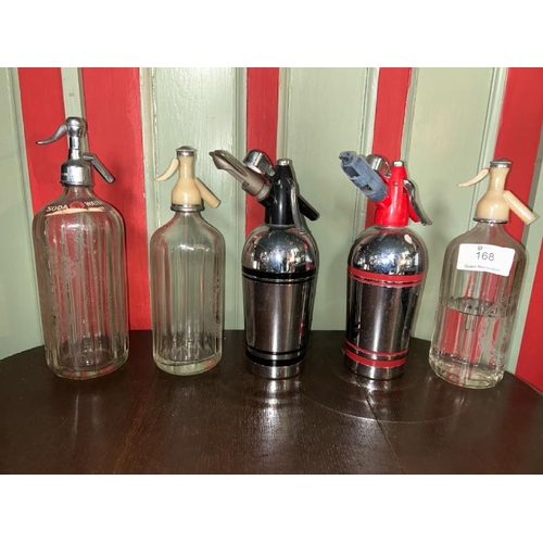 168 - Five vintage soda syphons including Spooner & Sons, Schweppes and more  / All lots are located at Go... 