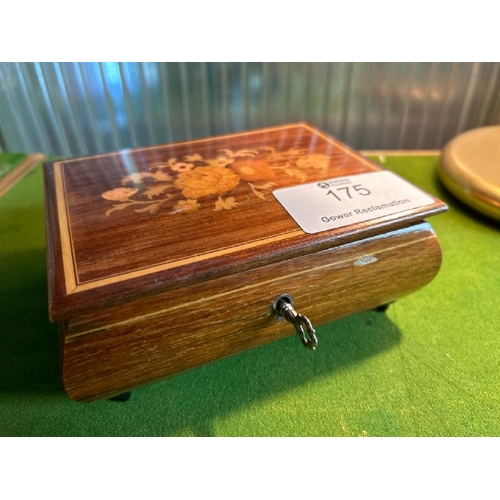 175 - Two graduated inlaid trinket jewellery boxes which both play music, one winder in need of repair, la... 