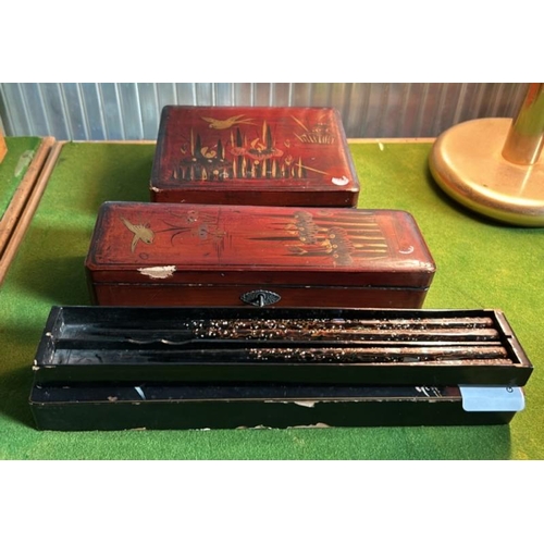 178 - Two oriental trinket boxes and set of chop sticks, largest 27cm (w)  / All lots are located at Gower... 