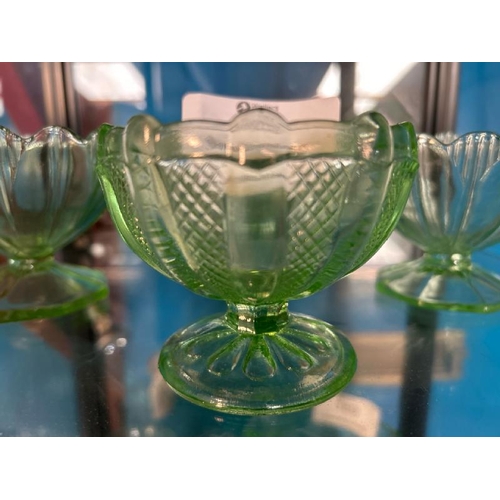 188 - Three matching and one smaller uranium glass desert cups, largest 10cm (dia)  / All lots are located... 