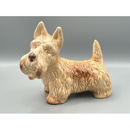 197 - Sylvac beige spotty dog porceline figurine number 72, good condition, 13cm high  / All lots are loca... 