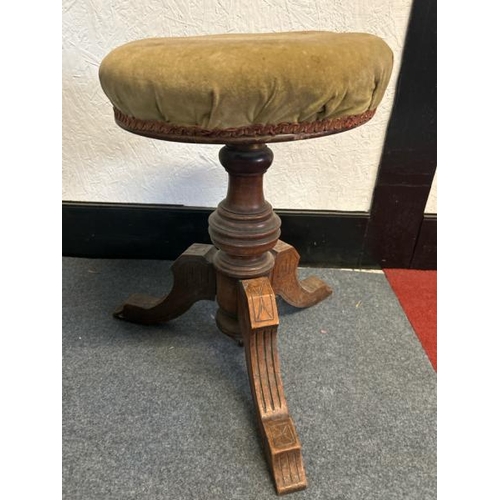 21 - A Victorian upholstered adjustable stool on a carved oak triform base, 50cm (h) x seat 40cm (dia)  /... 