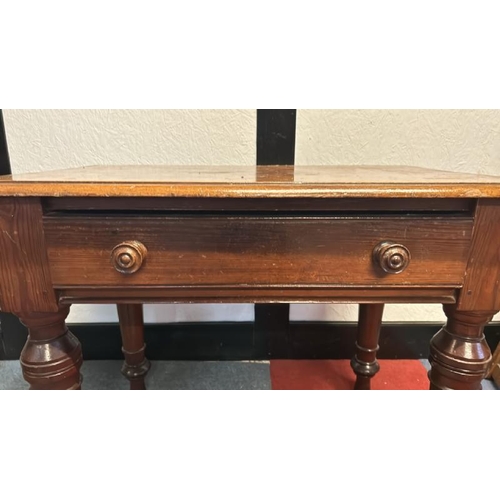 22 - A Victorian pitch pine desk with single drawer on turned and fluted legs, 78cm (h) x 91cm (w) x 60cm... 