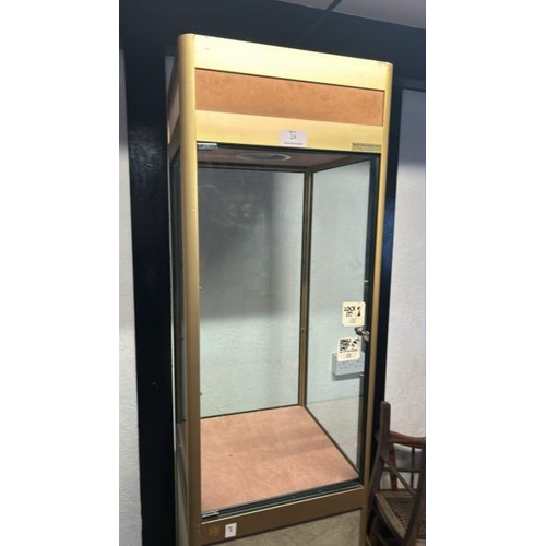 24 - A tall glass display cabinet, with key, without internal glass shelf, 200cm (h) x 50cm (w) x 50cm (d... 