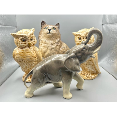 241 - Collection of porceline animals including Beswick cat dated 1967, owls and west german elephant, tal... 