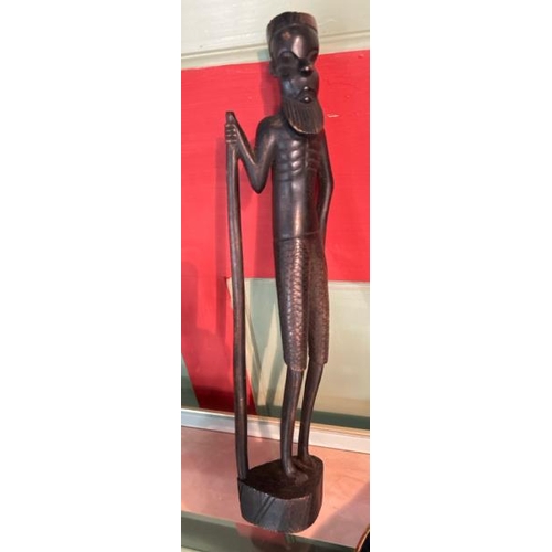 242 - Carved dark wood african elderly man, 37cm high  / All lots are located at Gower Reclamation, Unit 1... 